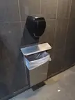[OC] This hand dryer is placed above the garbage bin. A piece of metal was installed to block the air from sending all the garbage flying.