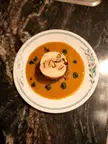 Sous Vide Chicken Ballotine with creme de volaille, a mushroom cream and a parsley oil.