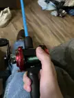 How to properly hold a baitcaster when you reel in?
