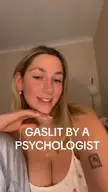 A fair-skinned blonde woman in a white tank top and light blue cardigan talking about being gaslit by a psychologist.