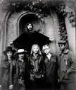 The Allman Brothers Band at Bond Tomb in Rose Hill Cemetery, Macon, Georgia during photo shoot for first album, Spring 1969, a Stephen Paley photo