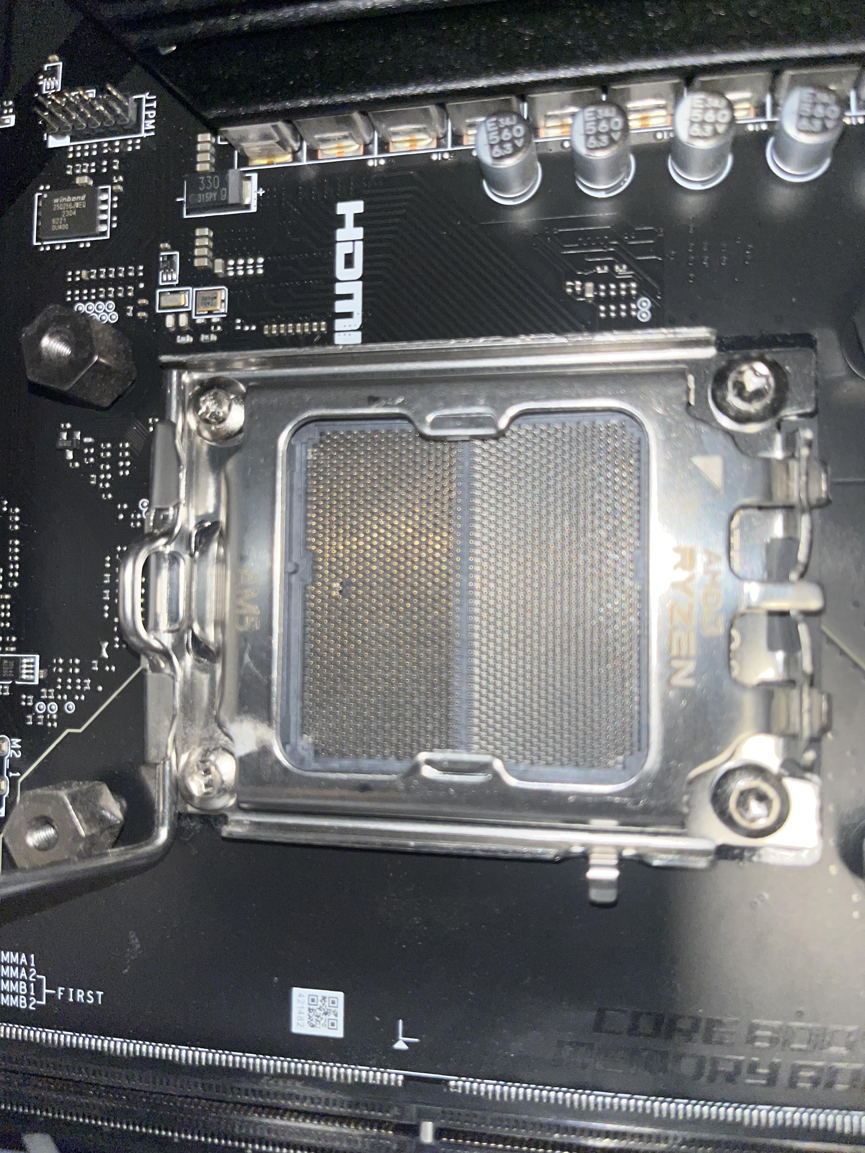Two bent pins on motherboard plus cpu debug led red and ram yellow ...