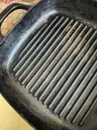 I scoured some rust off this IKEA grill pan, but it looks like some kind of finish has come off? Does this look normal/safe to use? Can I improve it? 