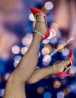 Red heels and fishnets!