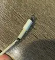 My official iPhone charger (included with AirPods) started smoking while I was watching YouTube. Is this a common issue?