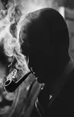 President Gerald R. Ford smoking his pipe looking like the album cover to a sick mixtape, Feb. 1974