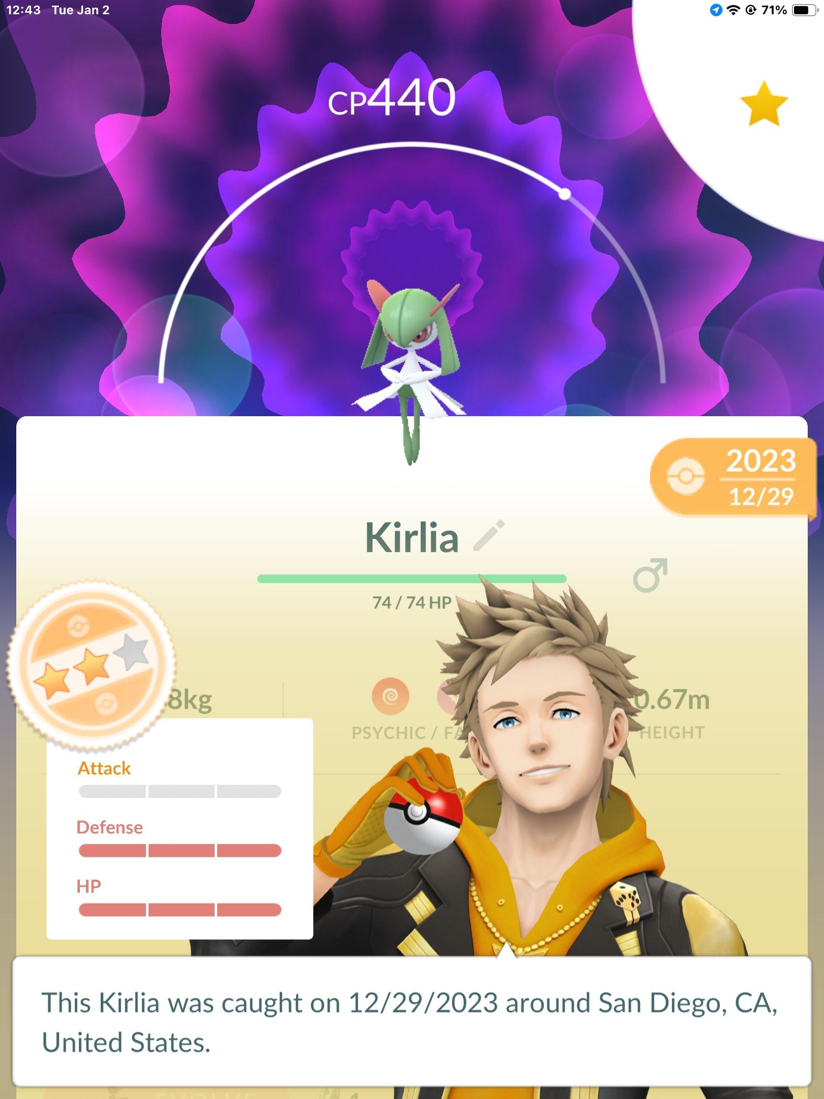 Pokémon GO screenshot of a Kirlia and a male character in a yellow hoodie and black jacket
