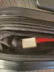 My new suitcase has a hidden compartment labeled hidden compartment.