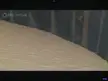 Still shot of apparent sink holes due to methane explosions. PBS documentary.