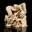 Ivory carving of a dentist treating a dragon. Japan, Meiji period, 19th century [1900x1900]