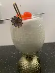 Orgeat chamomile latte with cocktail cherries