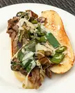 First ever homemade Philly cheesesteak with homemade bread, seasoned ribeye, fried green pepper/onion/jalapeno topped with provolone near the end. Turns out I don't have the right spatula to transfer it all to bread so I couldn't plate it how I dreamed, so delicious though
