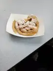 This is my school's idea of breakfast, a funnel cake.