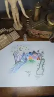A person creates concept art of a beautiful landscape by drawing the word EXPLORE with small figures and LEGO bricks.