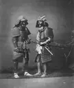 Two samurai in armor. Japan, 1870-1880. Photo taken by Stillfried &amp; Andersen.