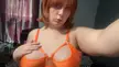 Pre op ts j_champ01 with short red hair wearing an orange bra taking a selfie