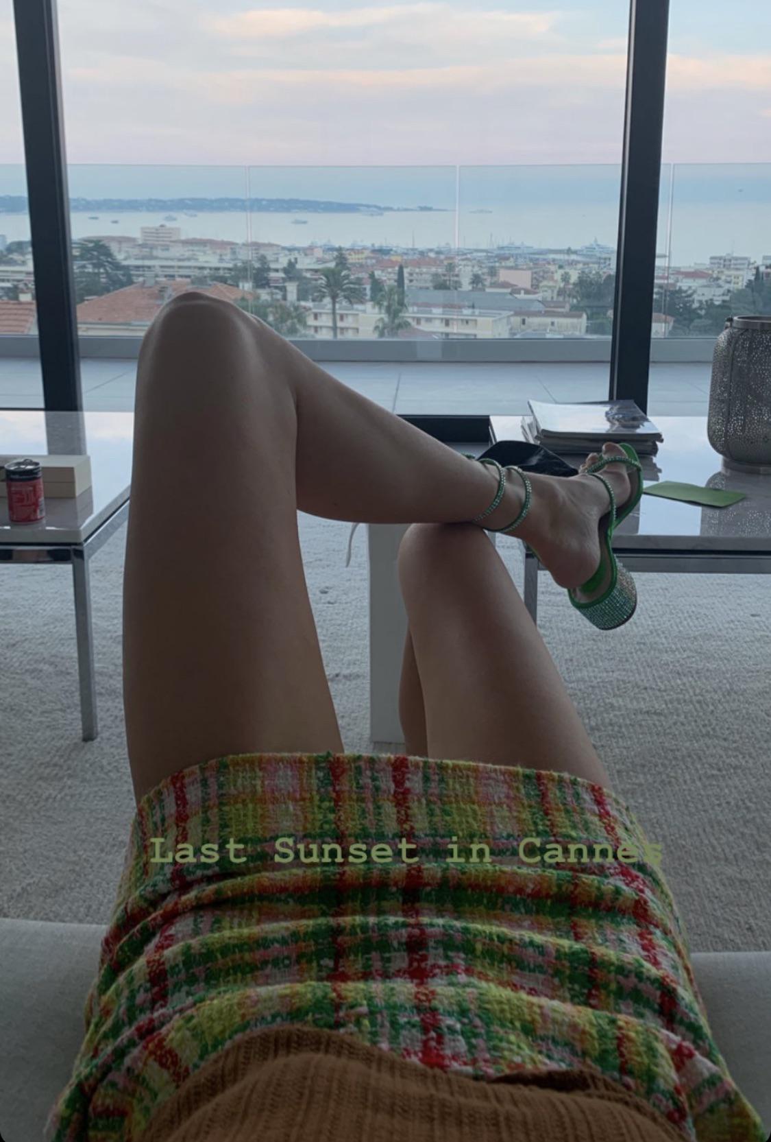 Elsa Hosk in a floral bikini at the beach, a beige dress, and a black blazer with shorts