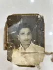 A terribly maintained hard copy picture of my grandfather. Please help me clean up and provide a frameable picture. $10 tip