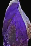Super rare C-face formation on this Amethyst crystal with super saturated Siberian purple coloring. [OC]