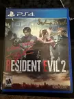Got my Resident Evil 2 Remake copy signed by Leon and Claire at Too many Games!