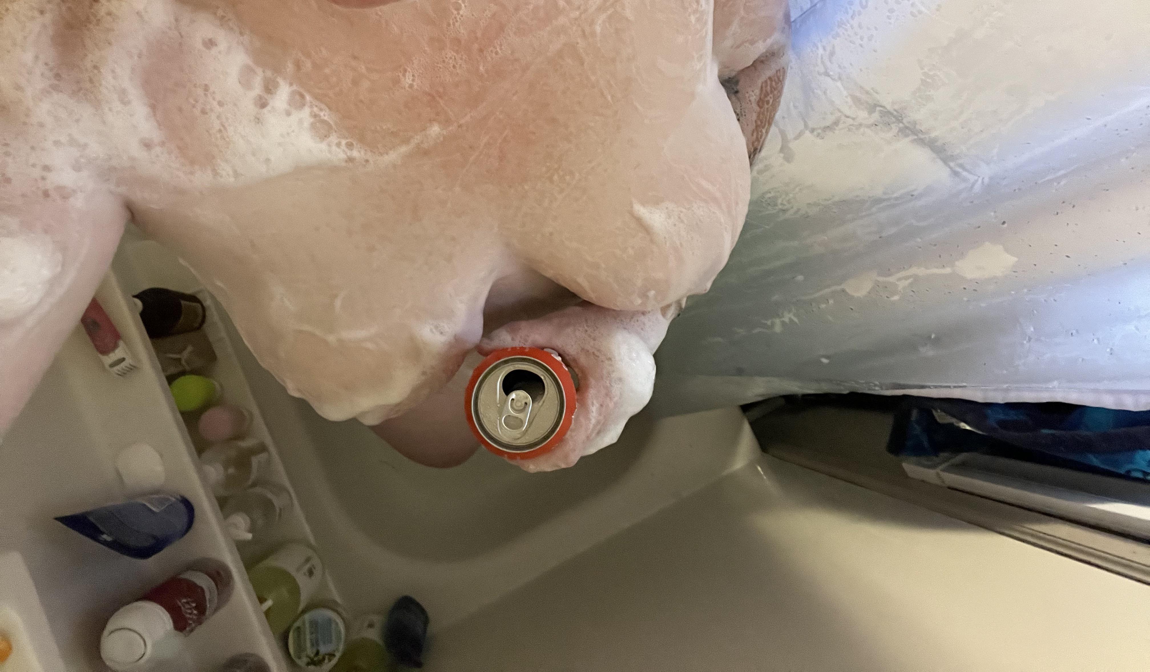 White man in a soapy bathtub masturbating with a Brigstone IPA beer can