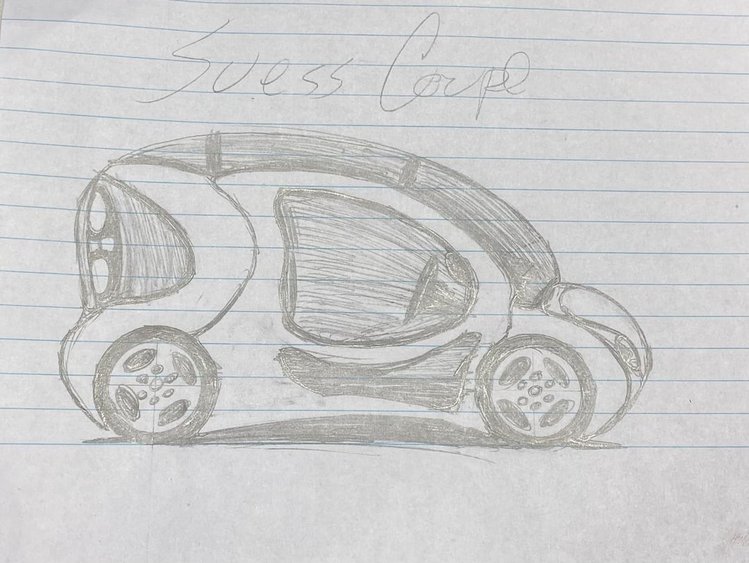 Silly concept car sketch of the Suess Coupe on lined notebook paper