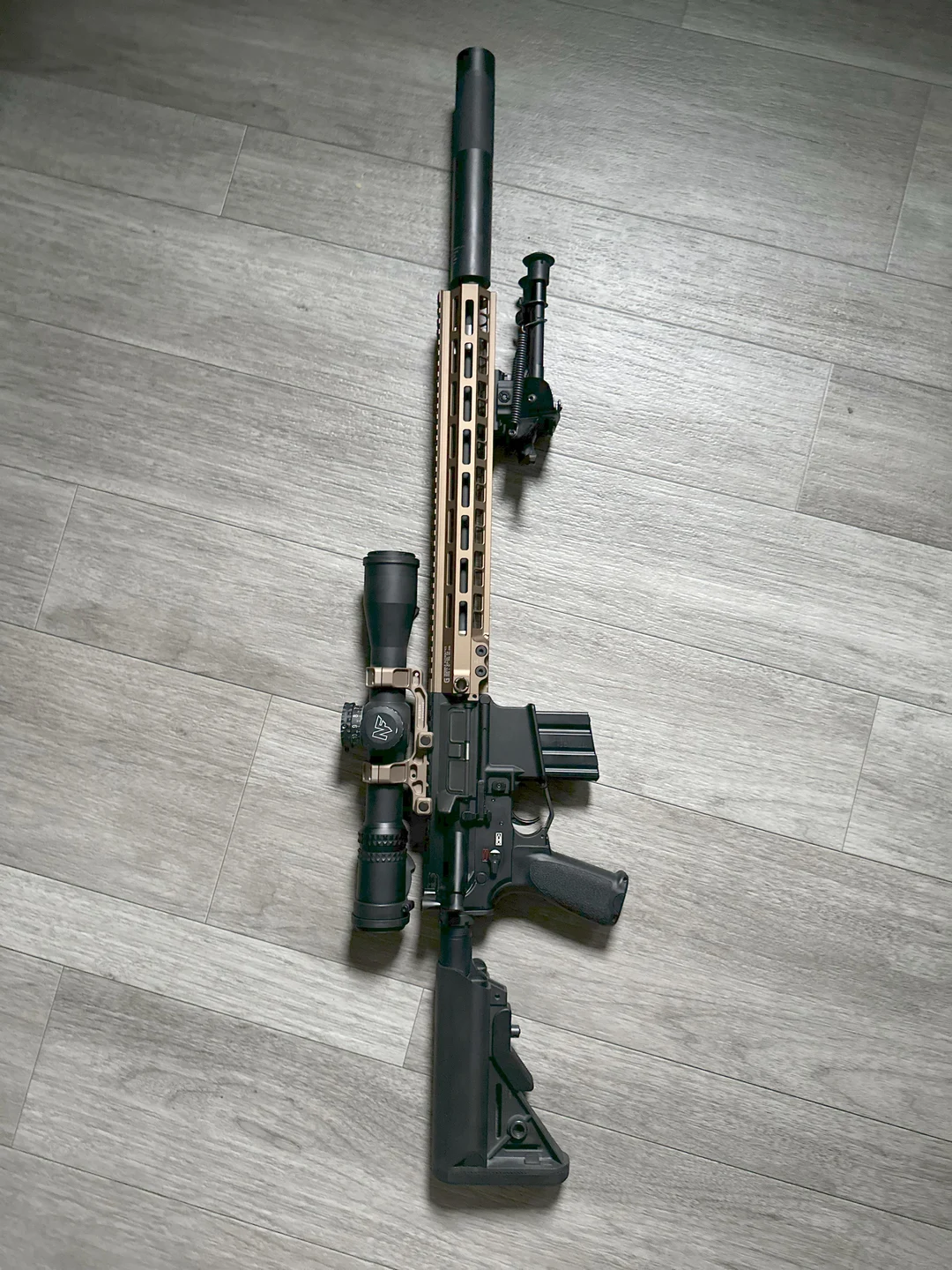 18” 5.56 rifle with a Douglas SPR Profile barrel and OCM5 suppressor ...