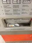 Stuffing food garbage in a metro ticket machine