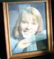 Phone photo of the framed high school graduation photo, circa 1987.