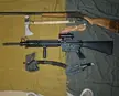 The single shot and m16 in duality of man.