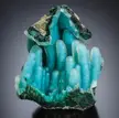 A piece of stalactitic chrysocolla crystal covered with pieces of quartz, found in Arizona.