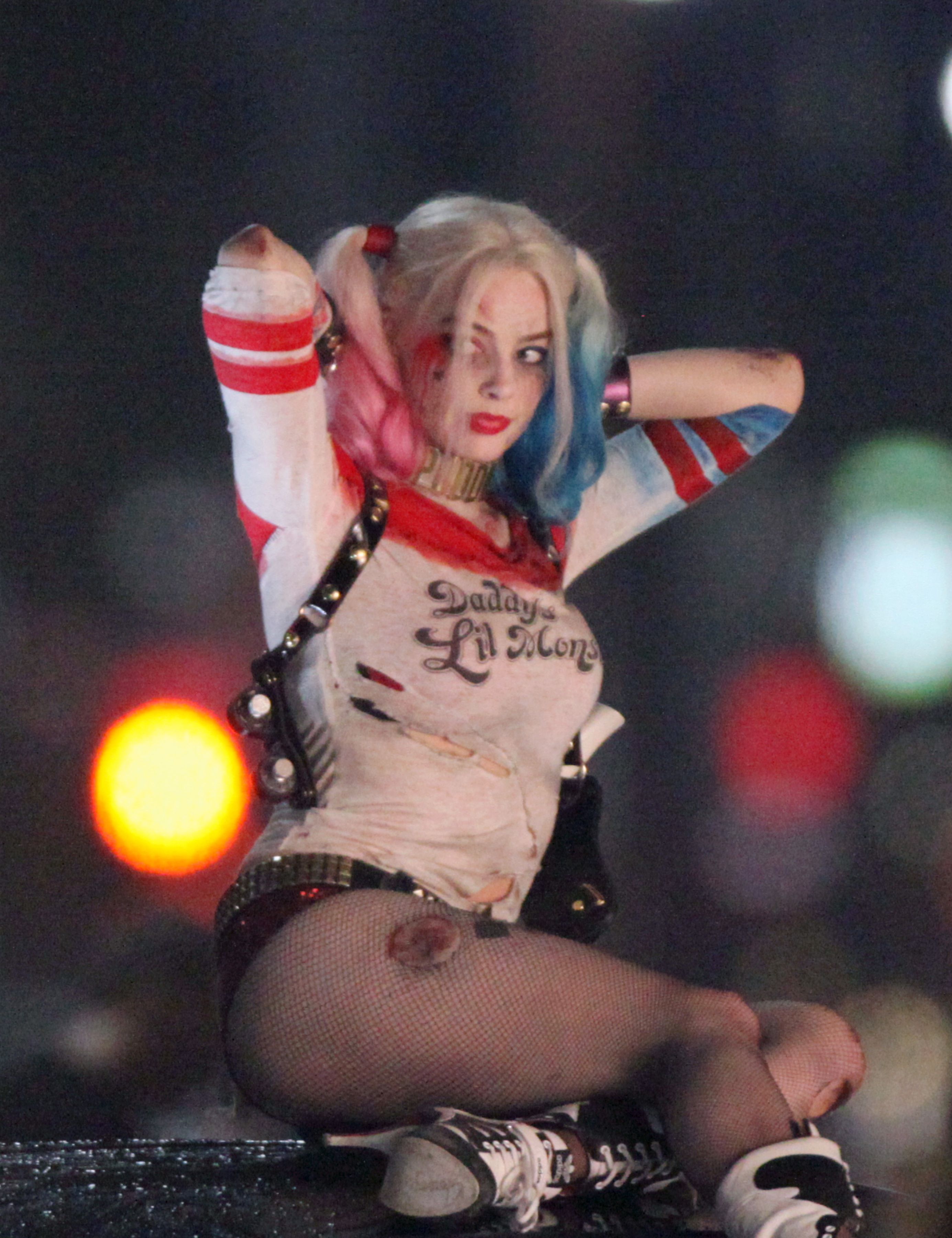 Margot Robbie as Harley Quinn