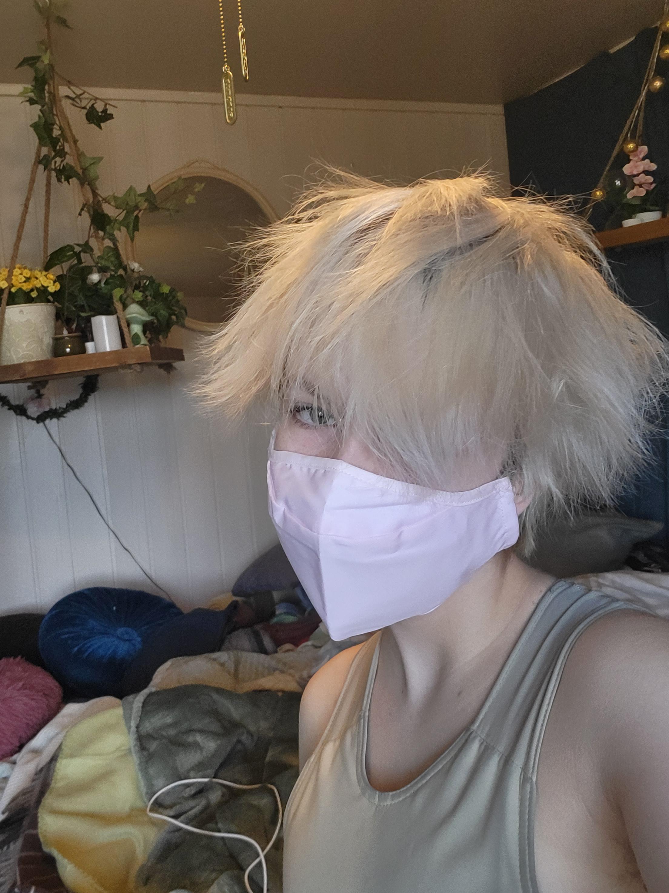 Fluffy femboy hair in blonde, black, blue, and pink colors with e-girl fashion, chokers, and chains.