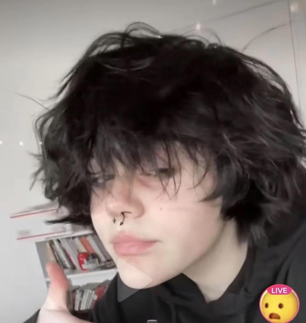 Fluffy femboy hair in blonde, black, blue, and pink colors with e-girl fashion, chokers, and chains.