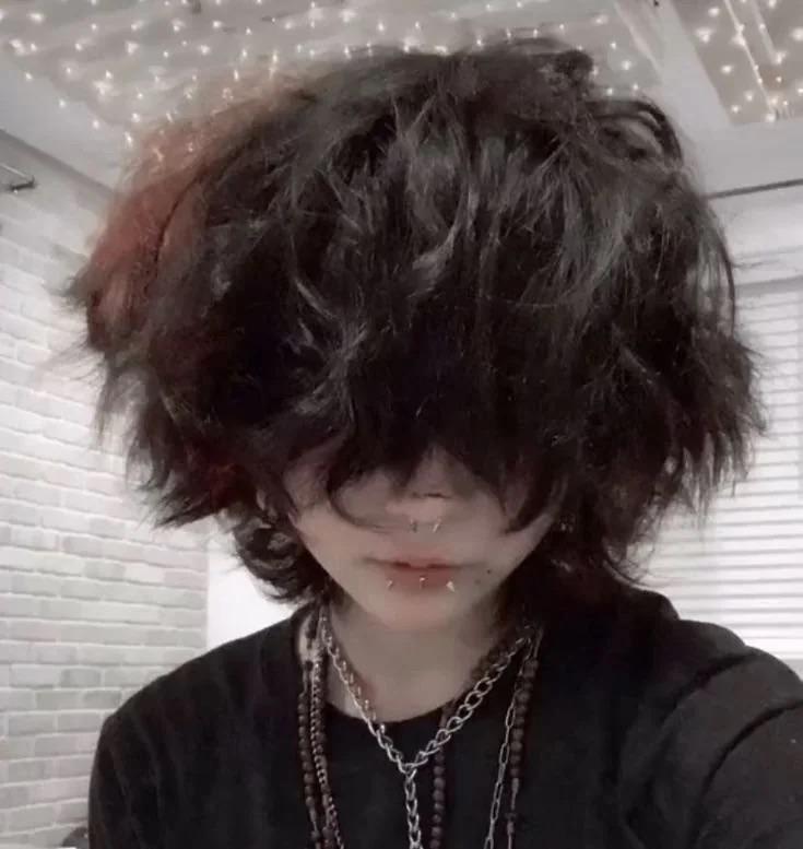 Fluffy femboy hair in blonde, black, blue, and pink colors with e-girl fashion, chokers, and chains.