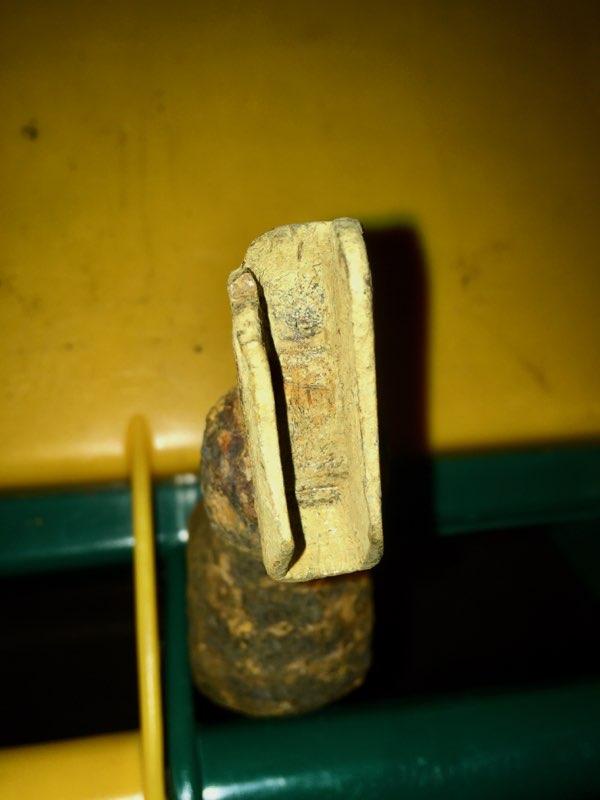 Pear shaped all metal tool with slotted front piece seemingly made for ...