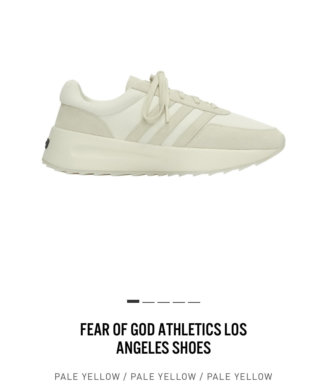 Pale yellow Fear of God Athletics Los Angeles sneakers by Kanye West on a white background