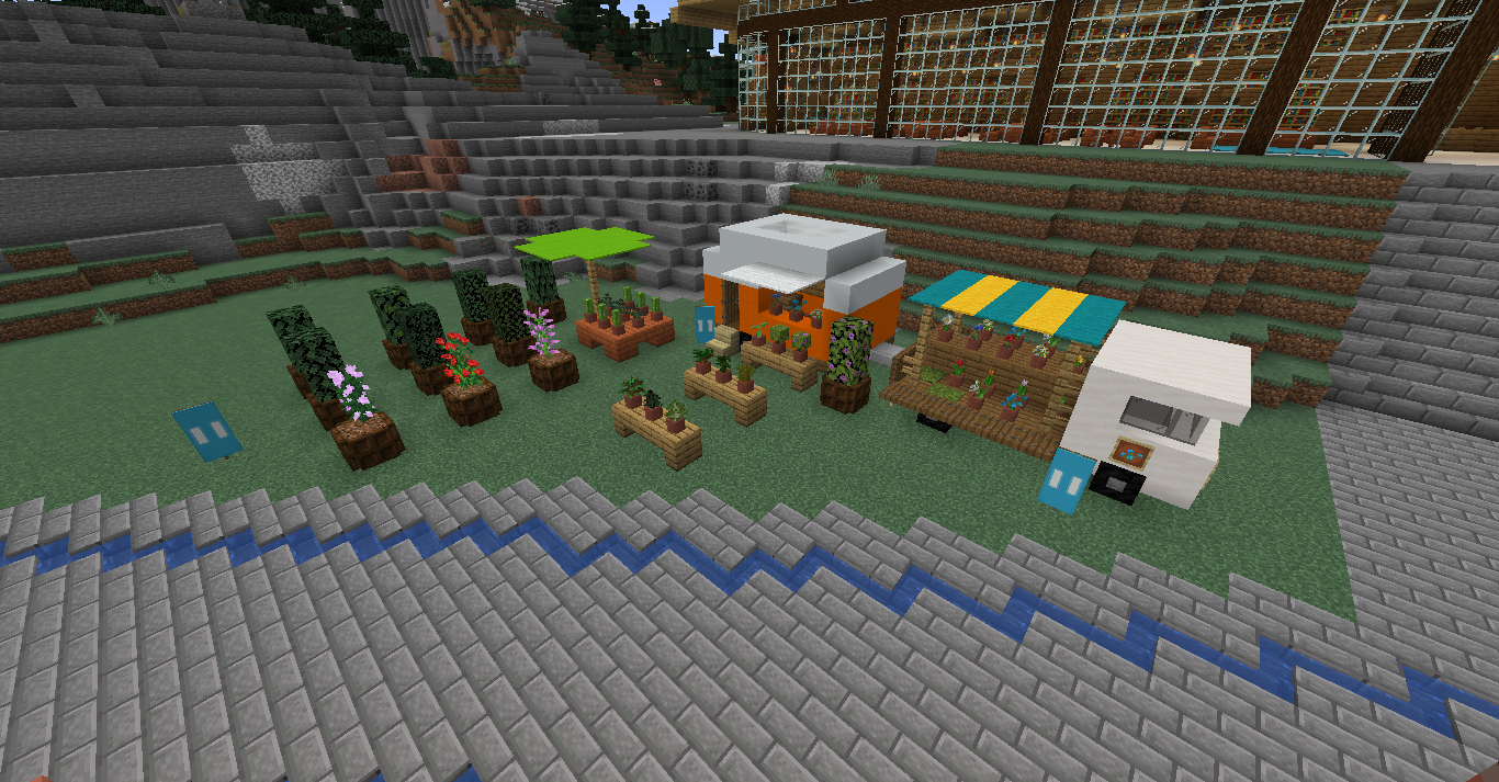 Cute small Minecraft builds of a flower shop with orange and white stalls and a FLOWERS sign