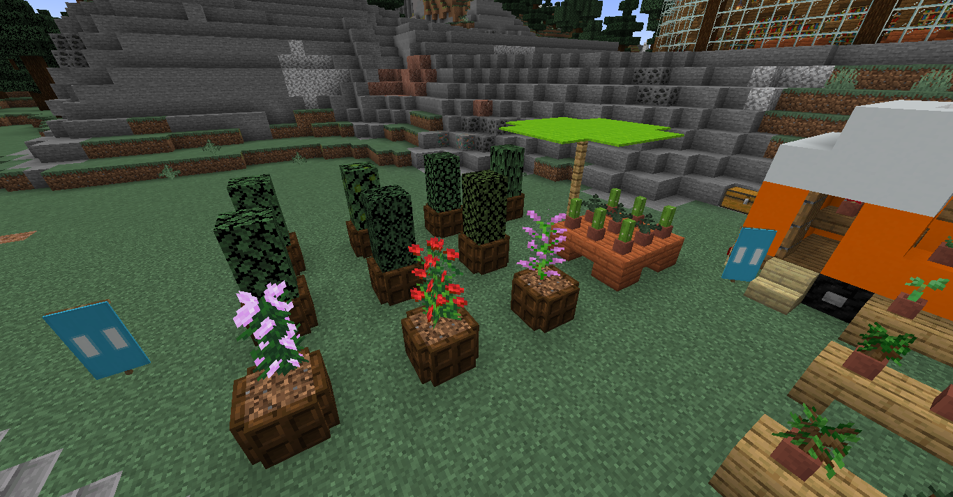Cute small Minecraft builds of a flower shop with orange and white stalls and a FLOWERS sign
