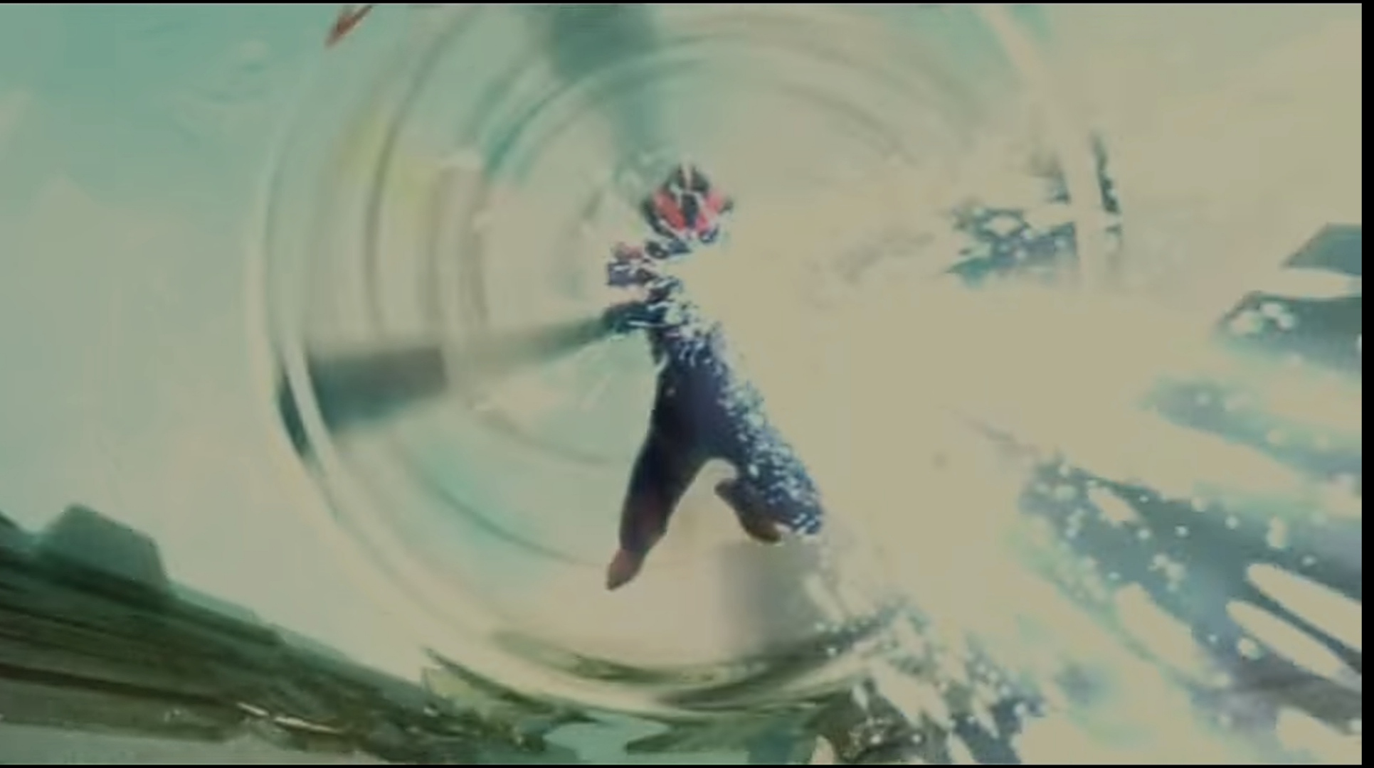Zoffy, the strongest Ultra Brother, unleashing a massive energy blast against monsters in a rocky landscape.