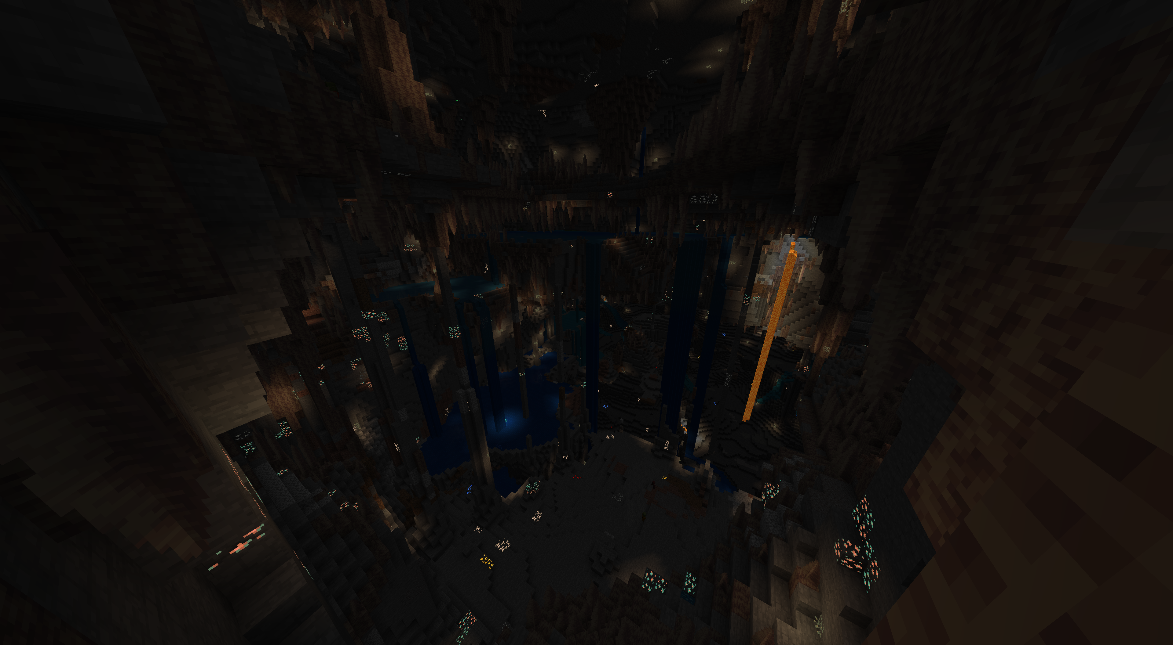 Minecraft landscape with underground caves, mountains, and waterfalls from seed 844424996132328