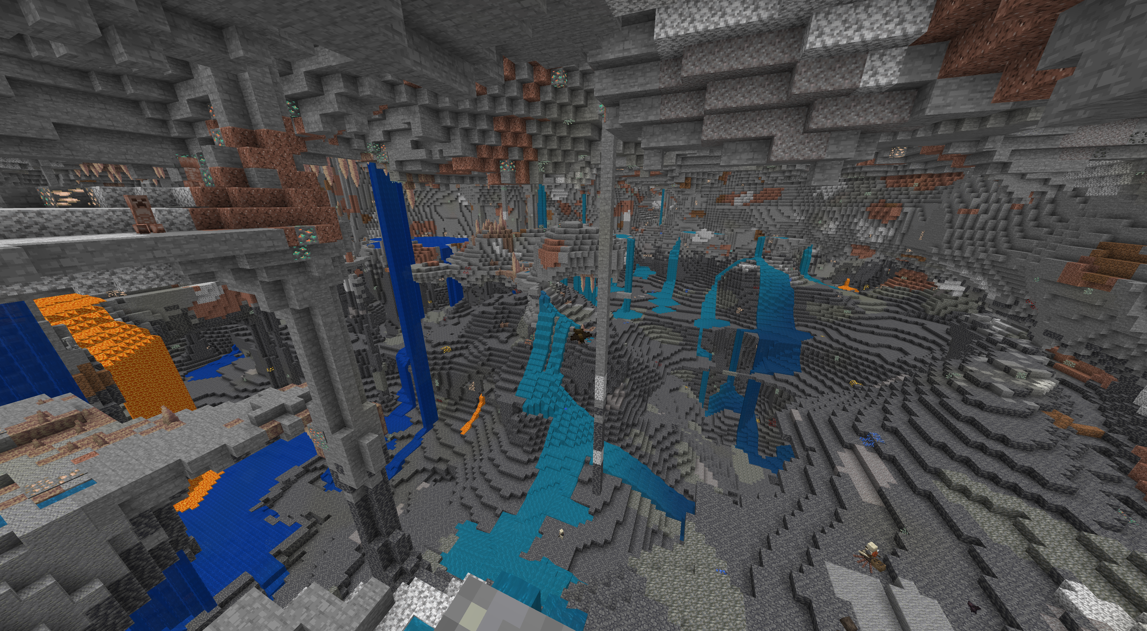Minecraft landscape with underground caves, mountains, and waterfalls from seed 844424996132328