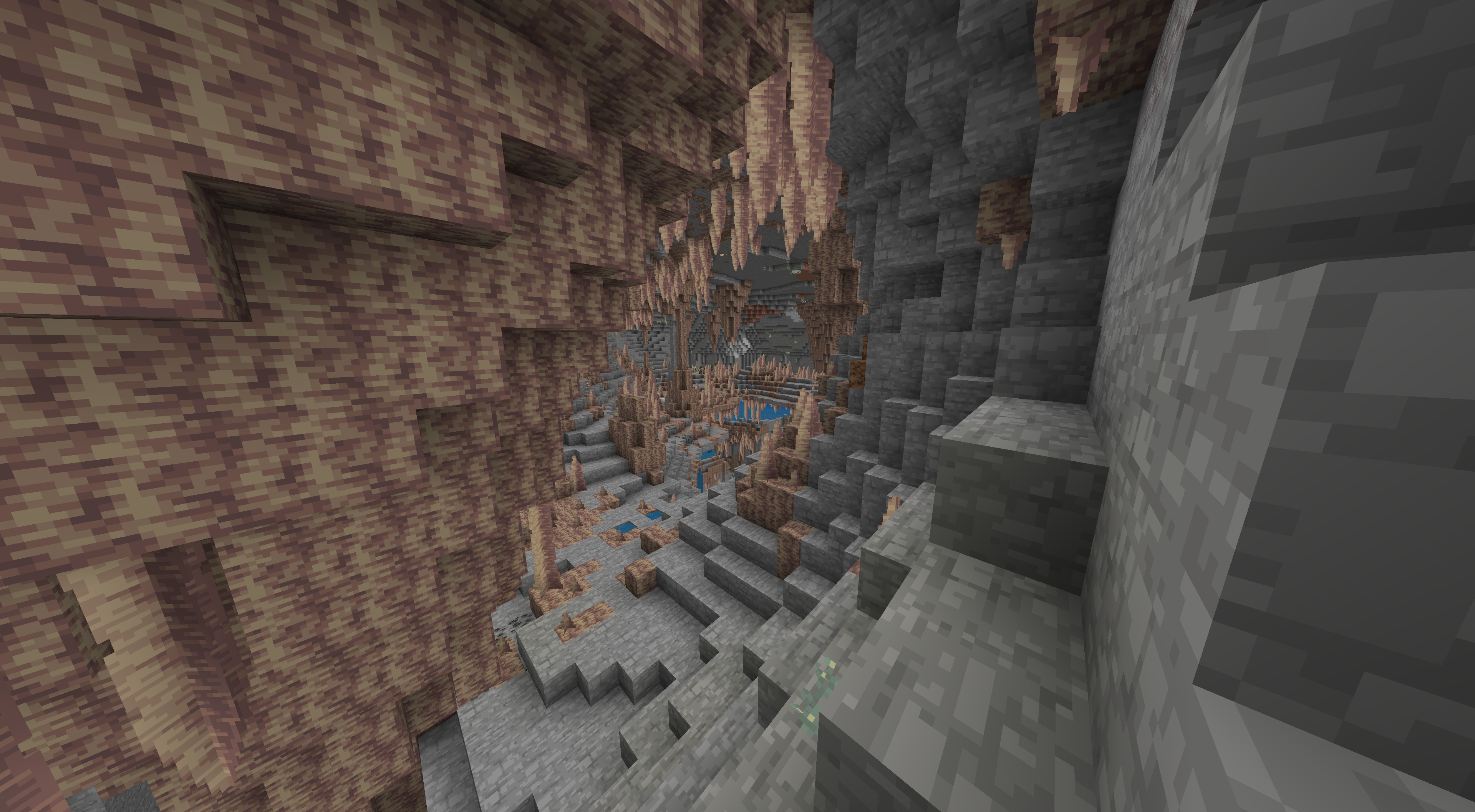 Minecraft landscape with underground caves, mountains, and waterfalls from seed 844424996132328