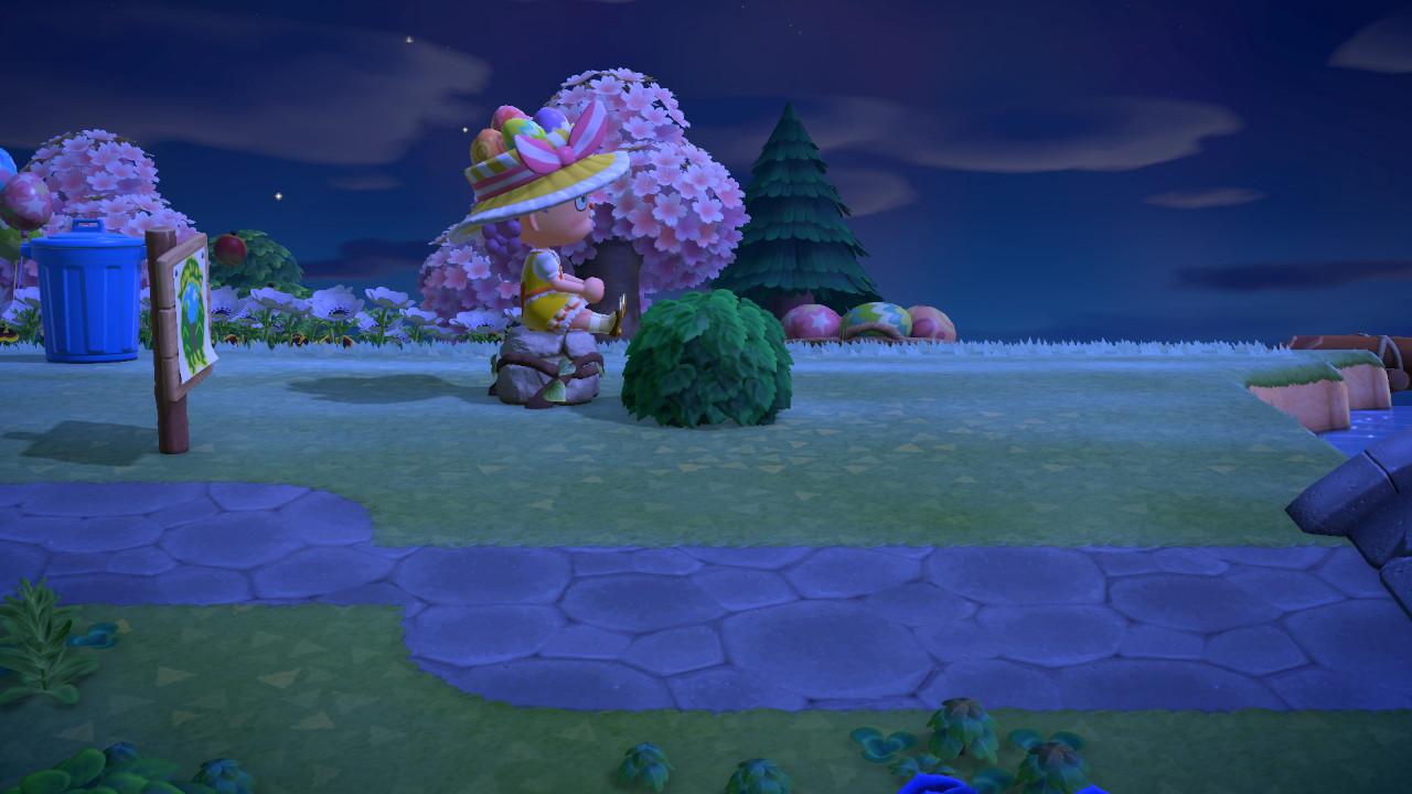 Animal Crossing: New Horizons character in a yellow floral dress and wide-brimmed hat by a bridge with cherry blossom trees