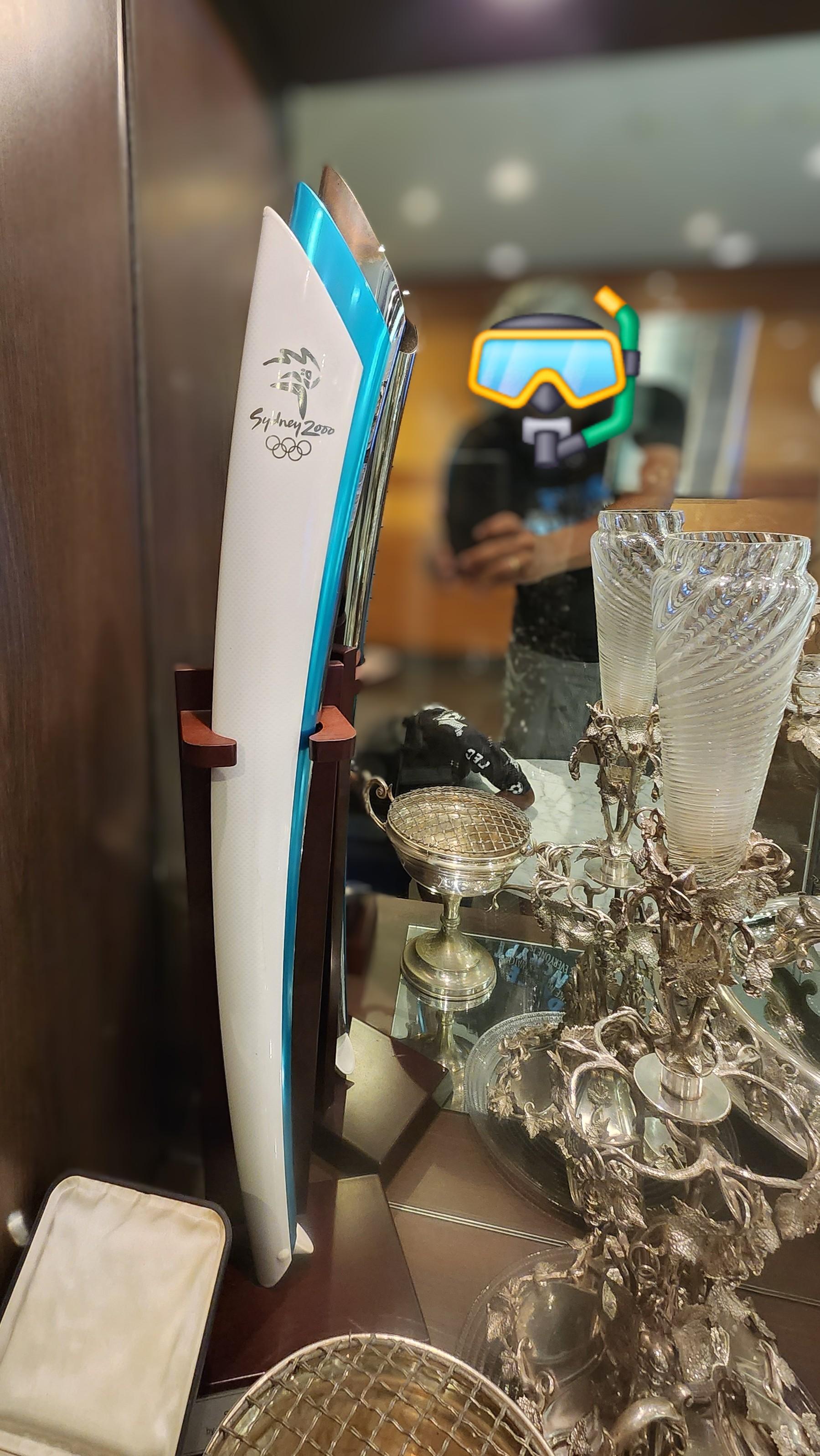 Sydney 2000 Olympic torch and commemorative plaque presented to the Sydney Rowing Club