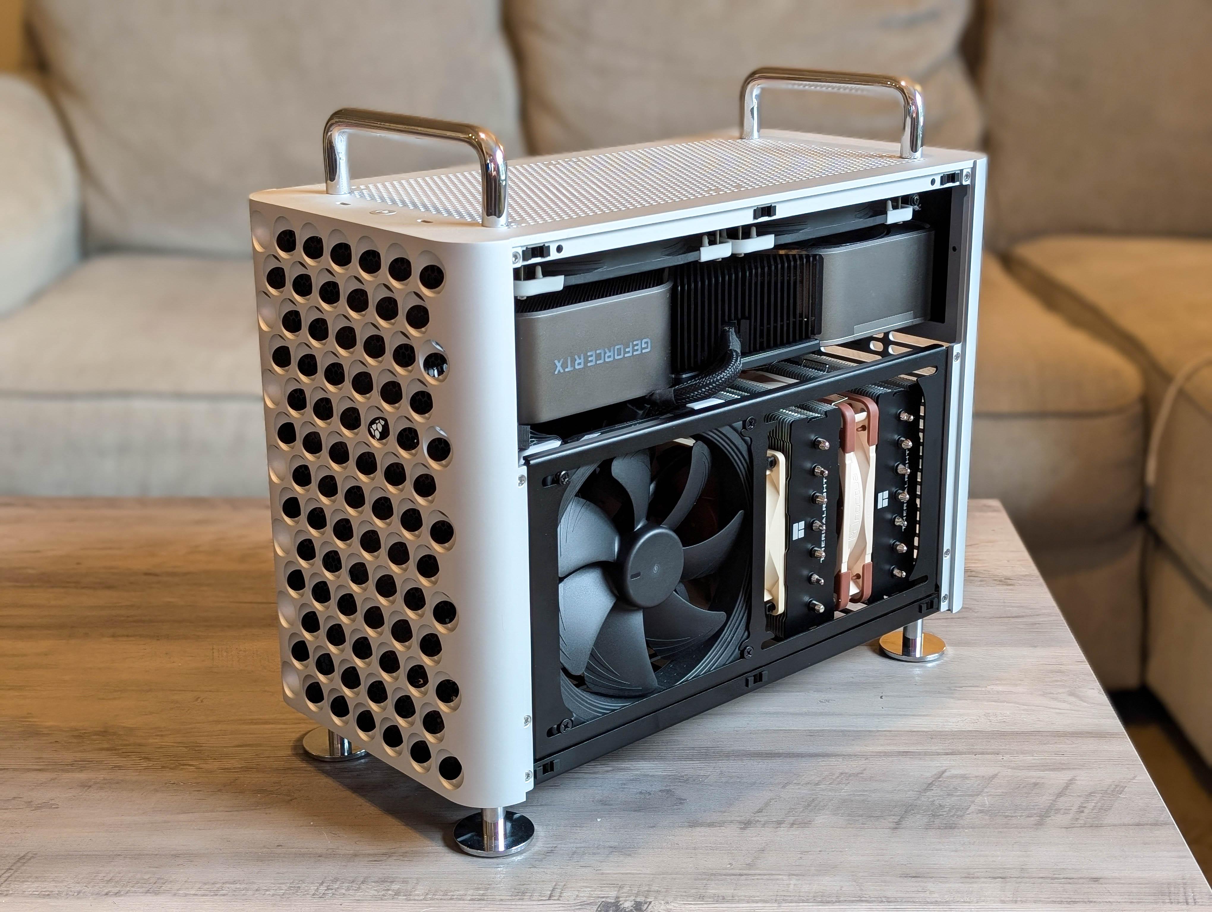 McPrue Apollo S v3 white compact custom gaming PC build on a desk with monitors, keyboard, and headphones