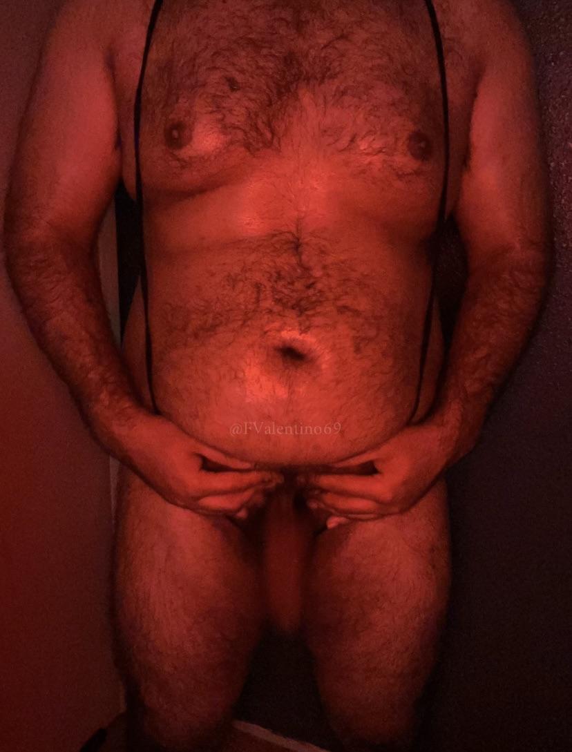 Hairy chubby man @FValentino69 posing in a black thong