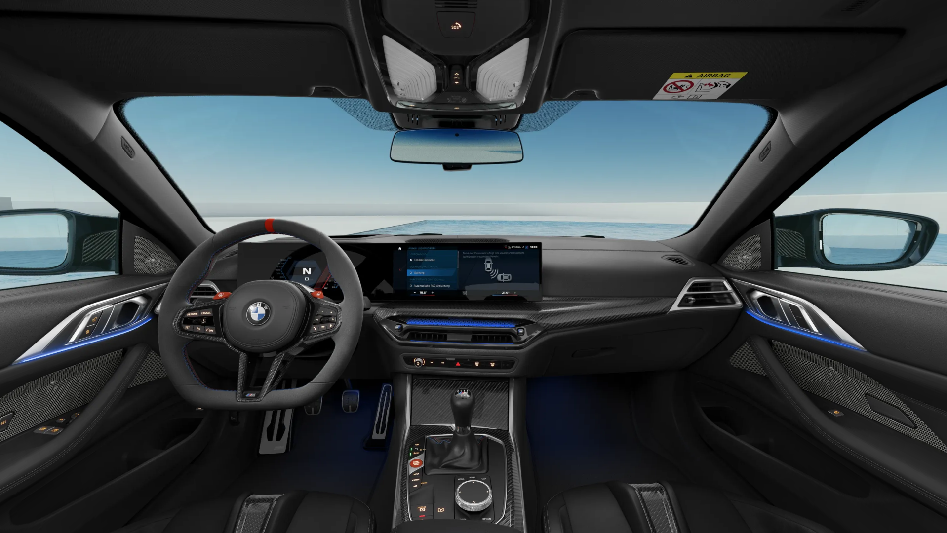 Grey BMW M8 coupe in a minimalist white architectural space by the ocean