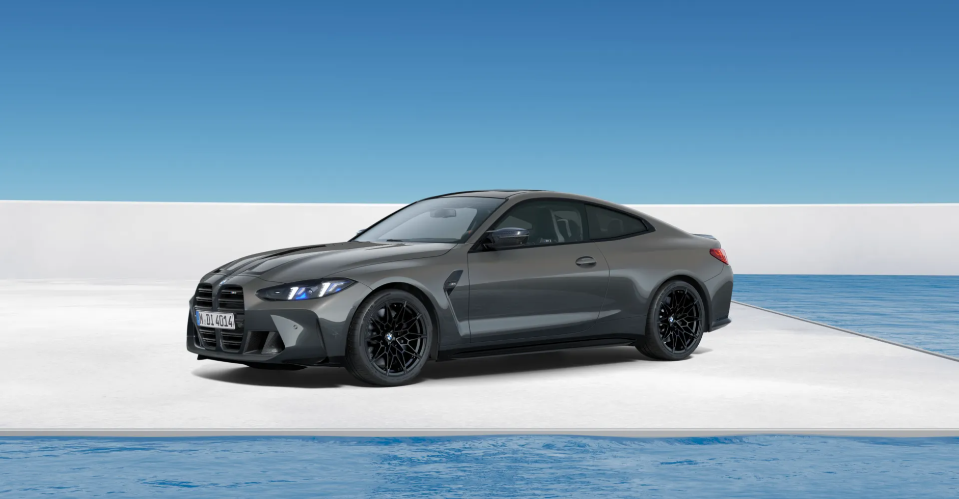 Grey BMW M8 coupe in a minimalist white architectural space by the ocean