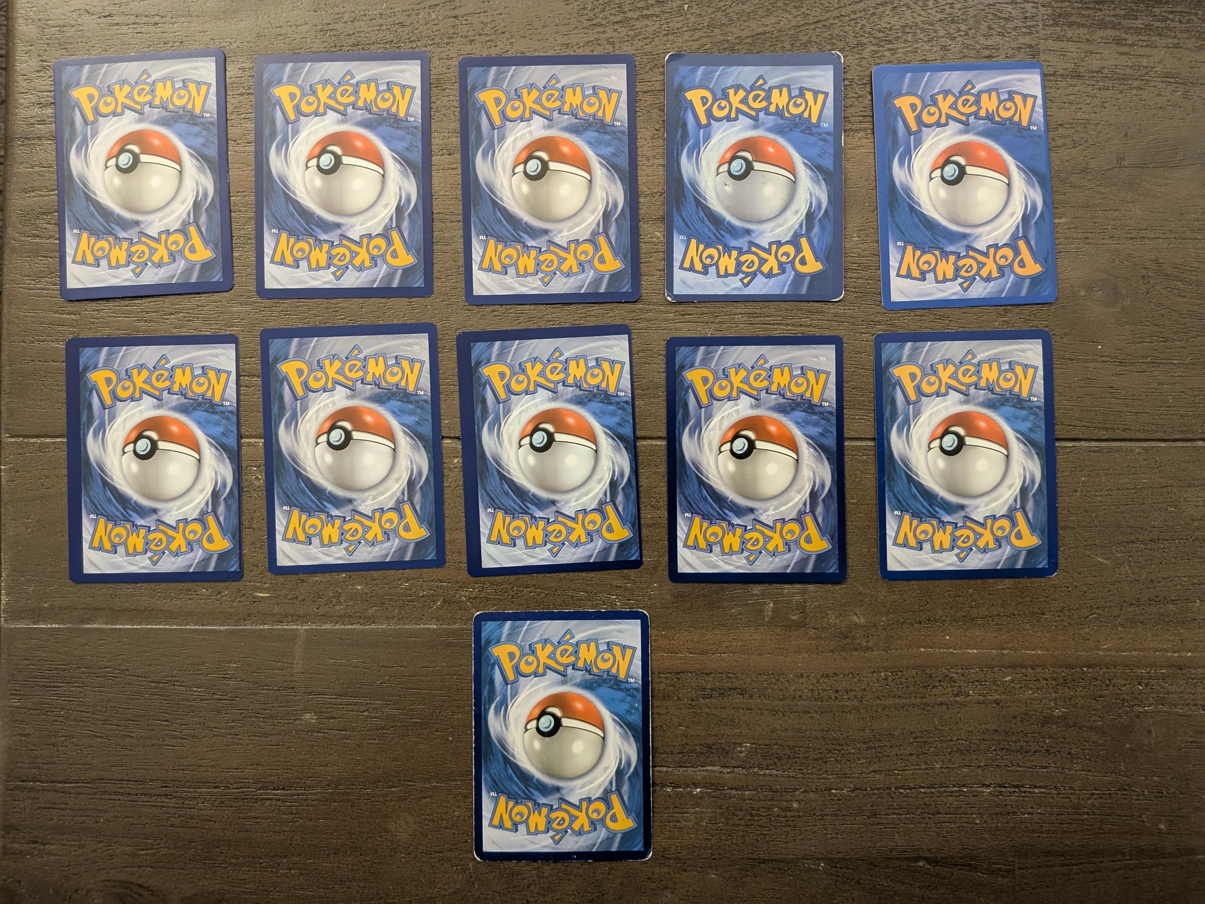 Which ones are fake? My son's cards Scrolller